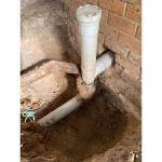 tree-root-wrappd-around-UPVC-drain