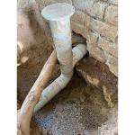 tree-root-wrapped-around-UPVC-drain