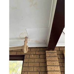 Water leaking into garage ceiling from shower above in Belconnen