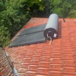 Heavy roof mounted solar hot water system has cracked roof tiles Ainslie Canberra