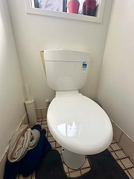 This Caroma Slimline is suitable as a replacement for older toilet cisterns because of its larger water capacity and adjustable flush volume
