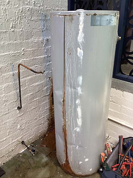 6 Star's Wanniassa plumbing services was able to remove and dispose of this long lasting but rusted Rheem electric hot water system