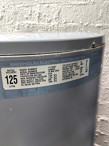 Our plumber in Wanniassa checked the date of manufacture and was not surprised by how long this Rheem hot water system survived.
